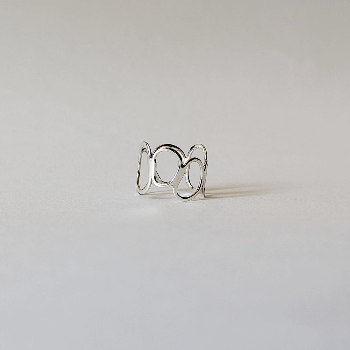 Silver Cairn ring on white background