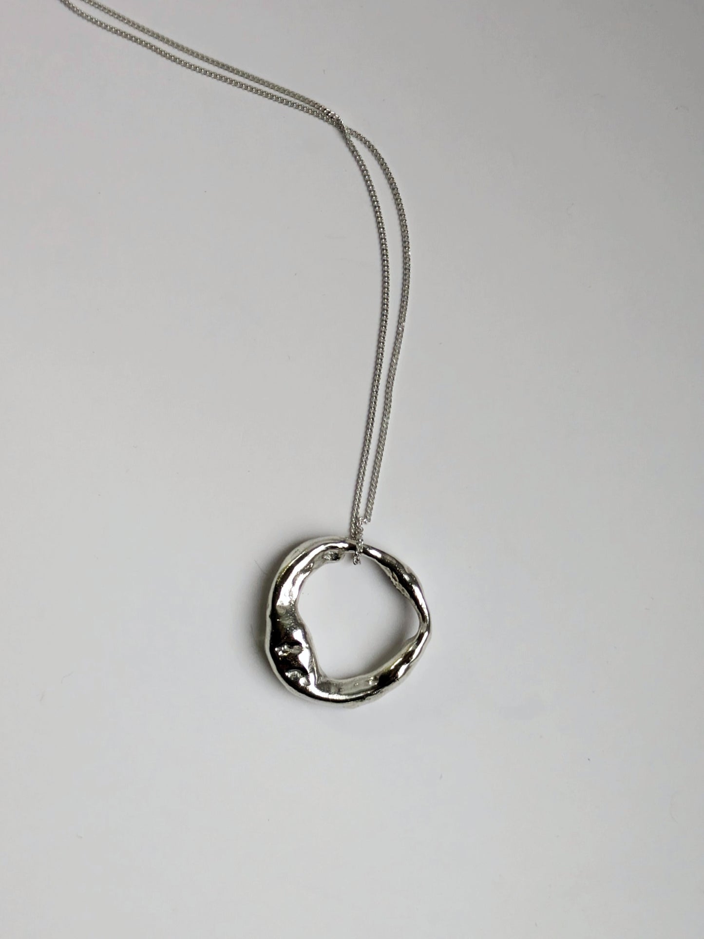 Molten Scrap Silver Pendant