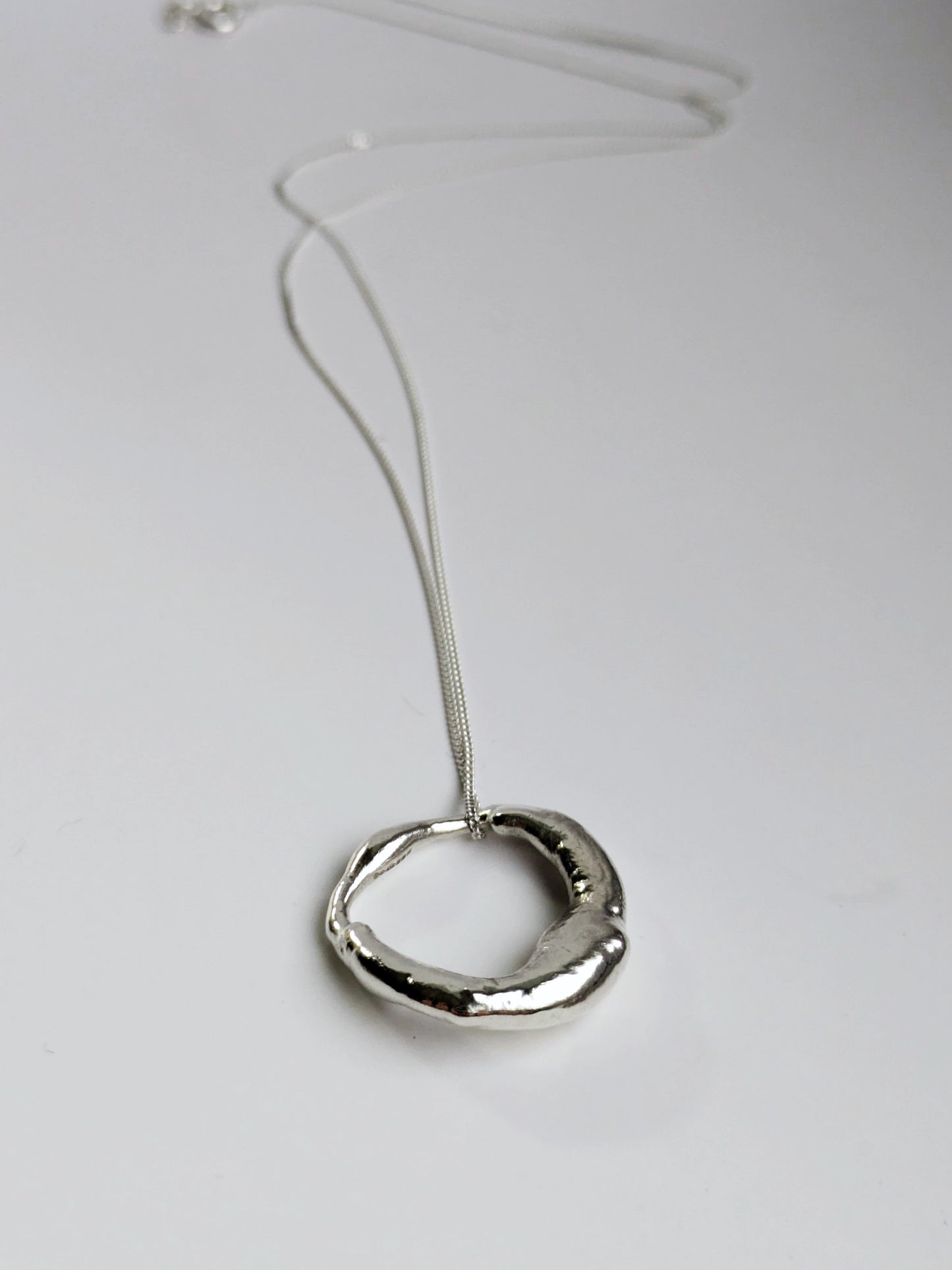 Molten Scrap Silver Pendant